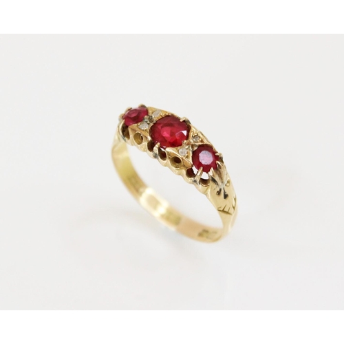 161 - An early 20th century synthetic ruby and diamond ring, comprising three round mixed cut rubies, meas... 