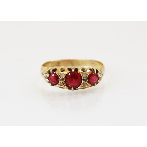 161 - An early 20th century synthetic ruby and diamond ring, comprising three round mixed cut rubies, meas... 