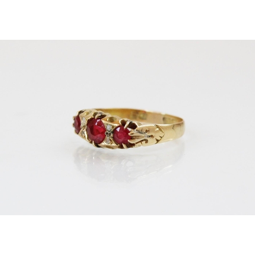 161 - An early 20th century synthetic ruby and diamond ring, comprising three round mixed cut rubies, meas... 