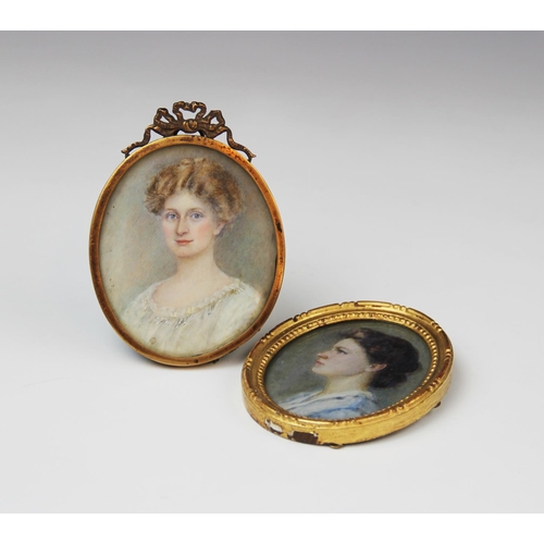 174 - A George V portrait miniature on ivory, early 20th century, depicting a bust length portrait of a la... 