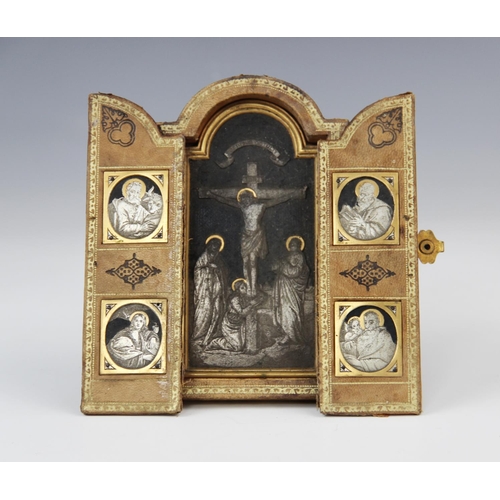 180 - A silver gilt and Niello travelling triptych, 19th century, the central arched panel depicting the c... 