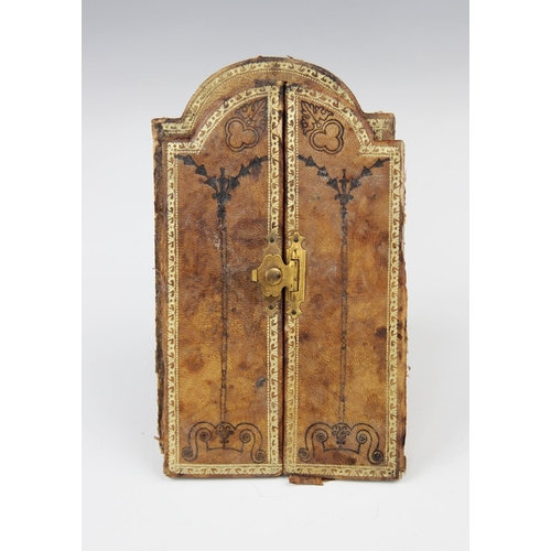 180 - A silver gilt and Niello travelling triptych, 19th century, the central arched panel depicting the c... 