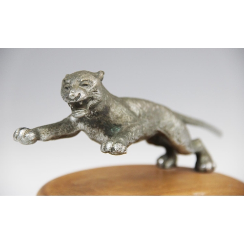 183 - A cast metal car mascot, early 20th century, probably by Desmo, naturalistically modelled as a leapi... 