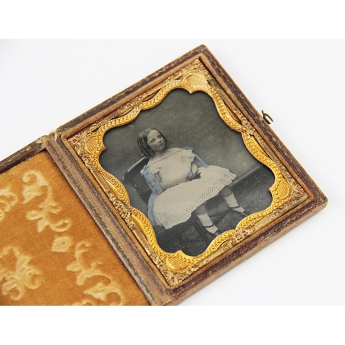 184 - A hand-coloured miniature photographic portrait on paper, early 20th century, depicting an Edwardian... 