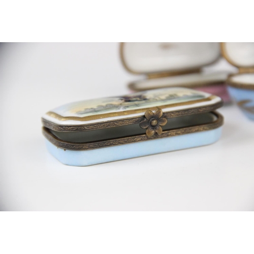 189 - A collection of Paris porcelain pill boxes, 19th century and later, comprising: three Limoges exampl... 