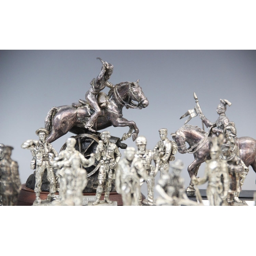 201 - A collection of silver plated Royal Hampshire Art Foundry military figures, to include mounted figur... 