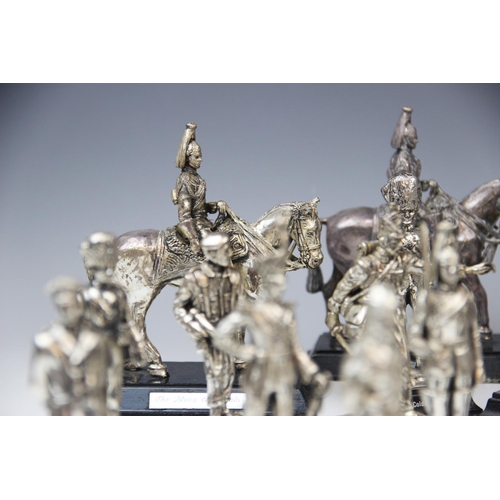 201 - A collection of silver plated Royal Hampshire Art Foundry military figures, to include mounted figur... 