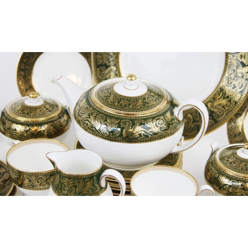 214 - A Wedgwood 'Florentine' part tea service, comprising: a teapot and cover, a milk jug, two sucriers, ... 