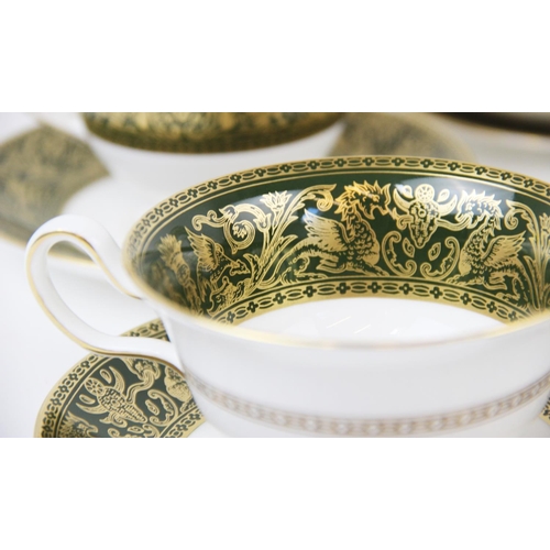 214 - A Wedgwood 'Florentine' part tea service, comprising: a teapot and cover, a milk jug, two sucriers, ... 