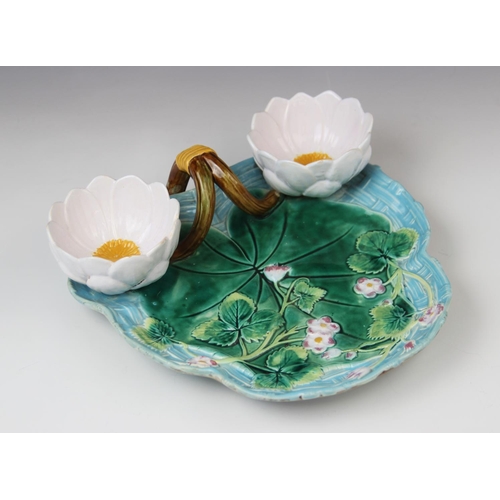 217 - A George Jones majolica strawberry dish, late 19th century, modelled as a lily pad on ozier ground w... 