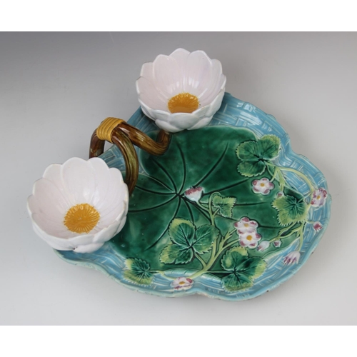 217 - A George Jones majolica strawberry dish, late 19th century, modelled as a lily pad on ozier ground w... 