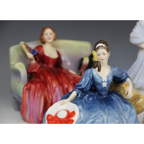 218 - A collection of Royal Doulton figurines, comprising: HN3975 'Lauren' (figure Of The Year 1975), HN12... 