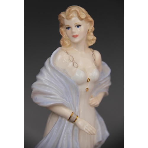 218 - A collection of Royal Doulton figurines, comprising: HN3975 'Lauren' (figure Of The Year 1975), HN12... 