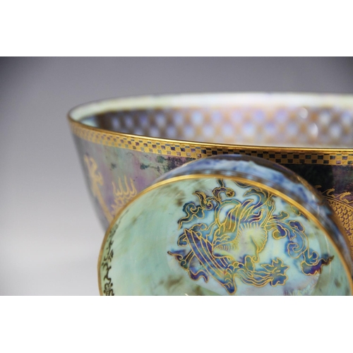 219 - A Wedgwood 'Dragon' lustre bowl, early 20th century, decorated with gilt highlighted dragons and oth... 