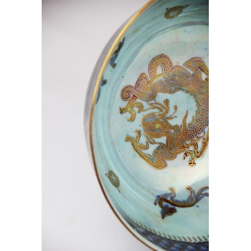 219 - A Wedgwood 'Dragon' lustre bowl, early 20th century, decorated with gilt highlighted dragons and oth... 