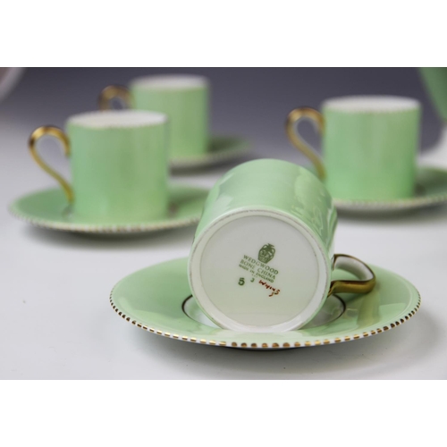 220 - A Wedgwood apple green six setting coffee service, early 20th century, comprising: six coffee cans, ... 