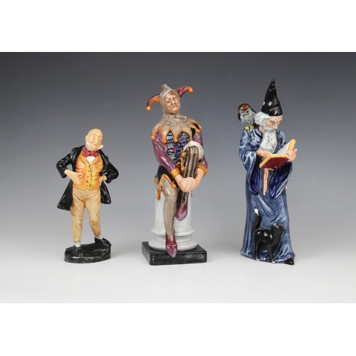 221 - Three Royal Doulton figurines, comprising: HN2016 'The Jester', HN2877 'The Wizard' and HN2097 'Mica... 