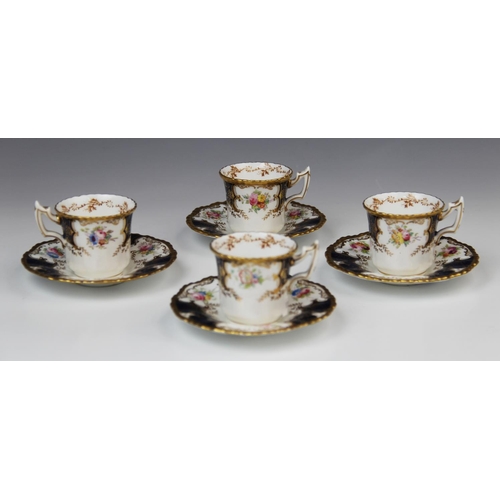 224 - Four Coalport 'batwing' coffee cups and saucer, early 20th century, each piece decorated with gilt s... 