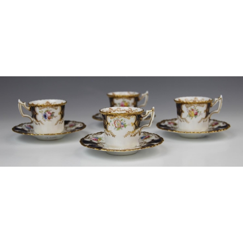 224 - Four Coalport 'batwing' coffee cups and saucer, early 20th century, each piece decorated with gilt s... 