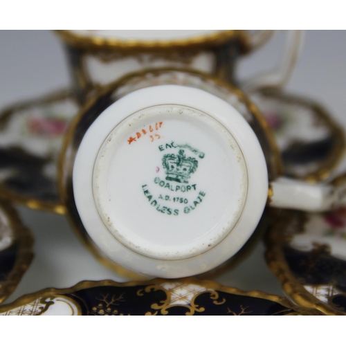 224 - Four Coalport 'batwing' coffee cups and saucer, early 20th century, each piece decorated with gilt s... 