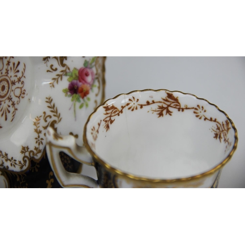 224 - Four Coalport 'batwing' coffee cups and saucer, early 20th century, each piece decorated with gilt s... 