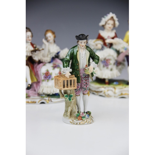 228 - A Volkstedt porcelain figural group, mid 20th century, modelled as a gentleman reading to a lady, 14... 