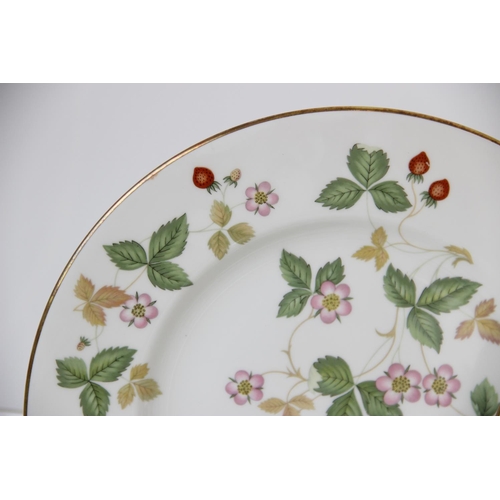 254 - A Wedgwood part dinner service in the 'Wild Strawberry' pattern, comprising: twelve dinner plates, e... 