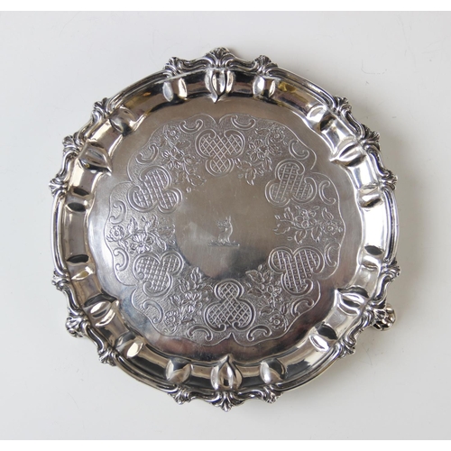 28 - A George III Irish silver waiter, possibly by Thomas Townsend, of circular form with scalloped borde... 