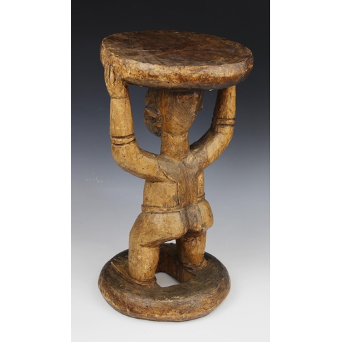 308 - A West African Cameroon grassland stool with figure, 42.5cm high