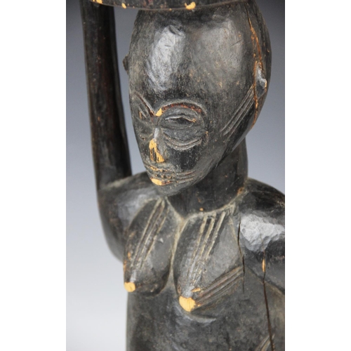 310 - A large West African Senufo Ivory Coast female figure, 56cm high