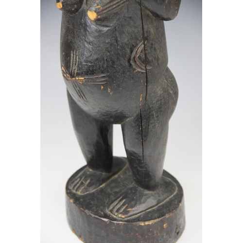 310 - A large West African Senufo Ivory Coast female figure, 56cm high