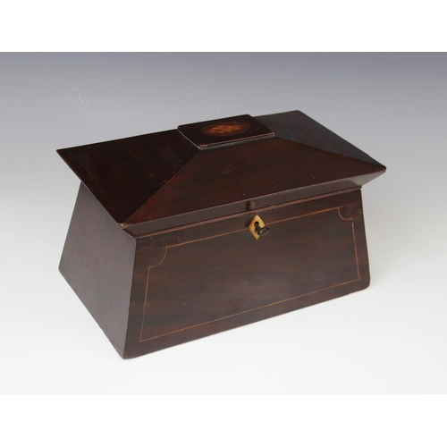 368 - A George III mahogany tea caddy, of sarcophagus form, the pagoda shaped hinged cover centred with an... 