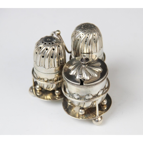 37 - A Victorian silver condiment set on stand by Horace Woodward & Co Ltd, London 1896-8, comprising wet... 