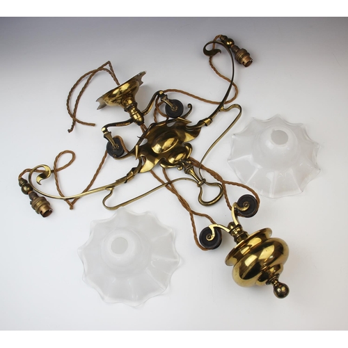 374 - A rise and fall Arts & Crafts brass ceiling light in the manner of W.A.S.Benson, early 20th century,... 