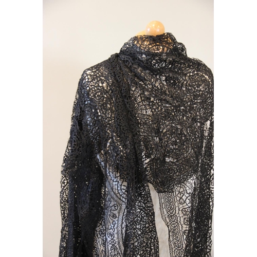 403 - A collection of black lace fragments and shawls, to include Brussels and Maltese lace, stoles, fring... 