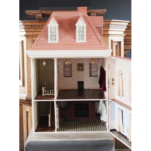 412 - A handmade craftsman built dolls house by Bernardo Traettino dating to 1988, modelled as a three sto... 