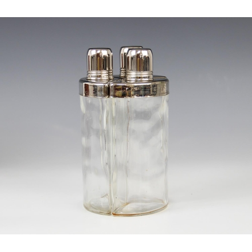42 - A mid 20th century three-piece glass and white metal hunting flask set, each of faceted form with pl... 