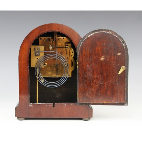 577 - An Edwardian mahogany mantel clock, of domed form, the case with inlaid chevron stringing, enclosing... 