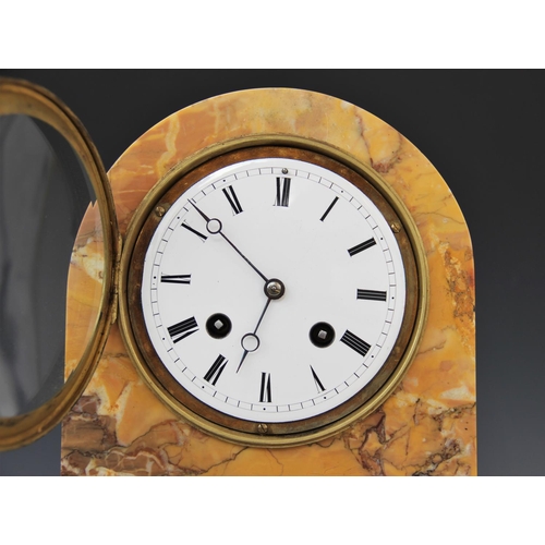 590 - A late 19th century crema Valencia marble mantel clock, the domed case housing the 11cm white enamel... 