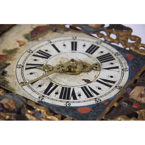 591 - A 19th century painted Dutch wall clock, the architectural canopy with a gilt painted metal figural ... 