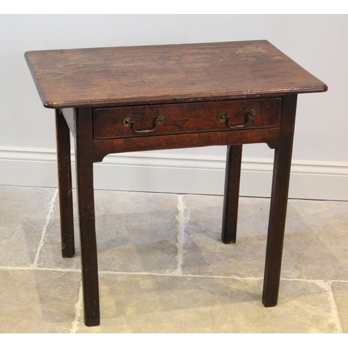 597 - An 18th century oak side table, the rectangular moulded top with rounded front corners above a singl... 