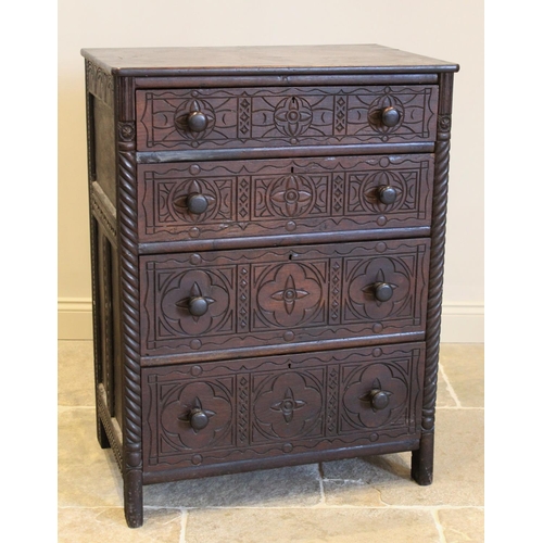 599 - An 18th century style oak chest of drawers, later constructed, formed as four long graduated drawers... 