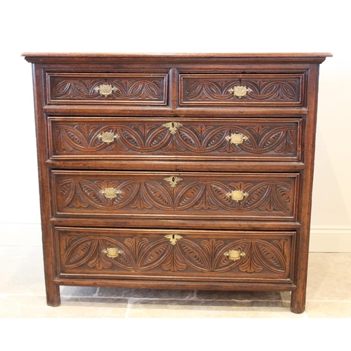 610 - A 17th century and later oak chest of drawers, the twin plank top over an arrangement of two short a... 