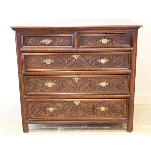 610 - A 17th century and later oak chest of drawers, the twin plank top over an arrangement of two short a... 