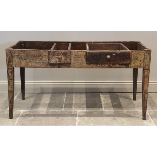 615 - An 18th century North Italian pine serving table, the plank top over two frieze drawers, raised upon... 