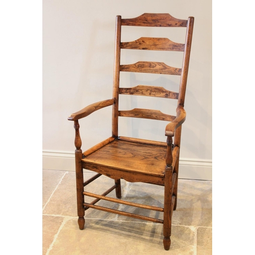 626 - An early 19th century ash and elm ladder back country chair, the five rung back above out swept arms... 