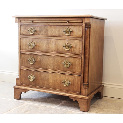 634 - A George III style mahogany bachelors chest, the rectangular thumb moulded top above a baize inset b... 