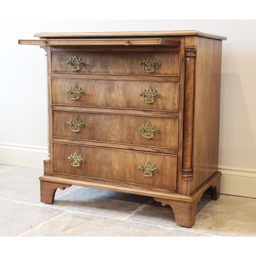 634 - A George III style mahogany bachelors chest, the rectangular thumb moulded top above a baize inset b... 