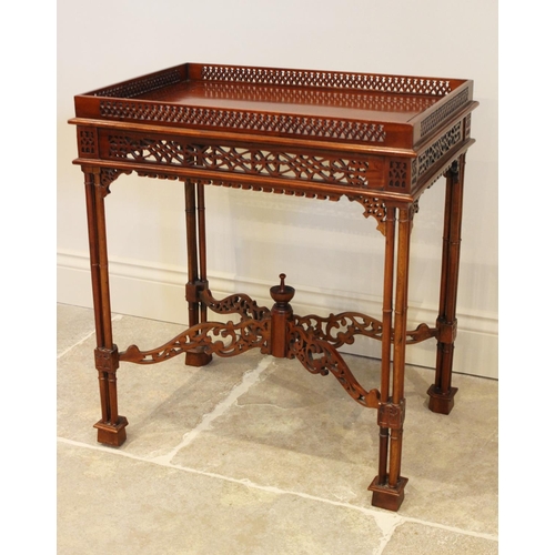 644 - A Chinese Chippendale style mahogany silver table, late 20th century, the rectangular top with a pie... 