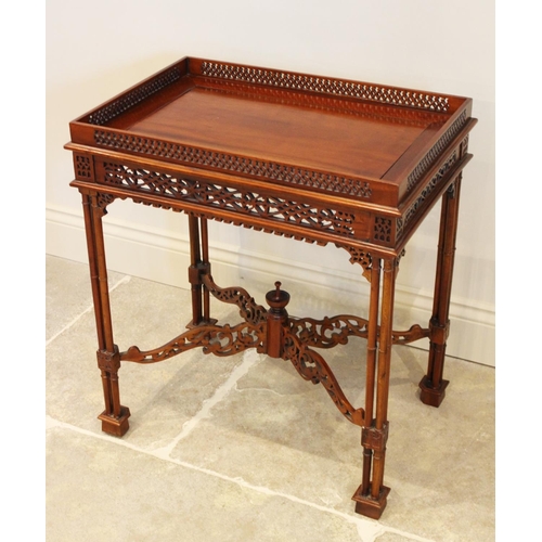 644 - A Chinese Chippendale style mahogany silver table, late 20th century, the rectangular top with a pie... 